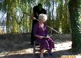 Granny receives a lesson from masked chap