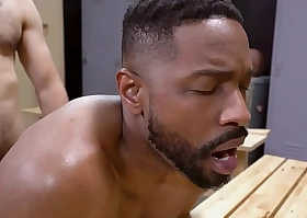 Black stud gets fucked in the locker section