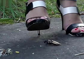 Outside roach crushing with high heels.