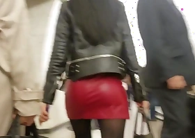 Sexy brunete s ass in all directions red leather skirt